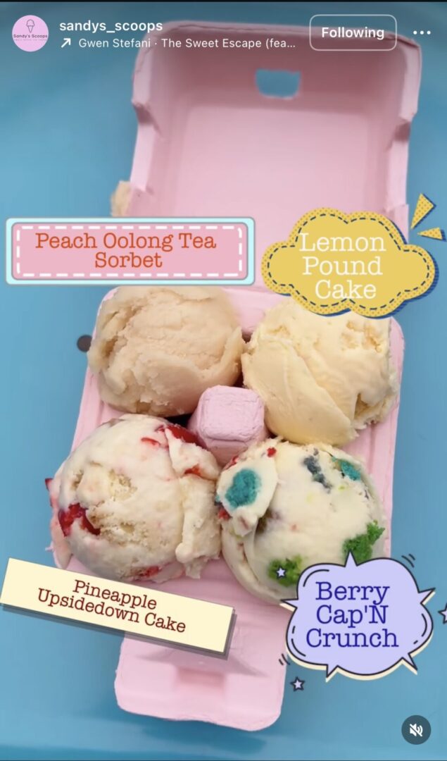 Ice cream scoops in a pink carton.