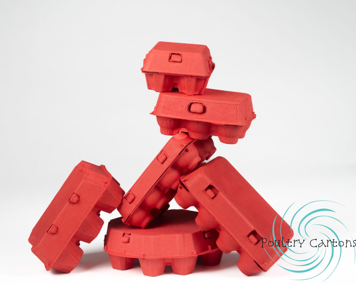 A stack of Poppy Red Octagon Paper Pulp Chicken Egg Cartons (12 eggs) in a disorganized arrangement against a white background.